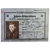 Årligt fiskekort för 14-årig pojke daterat 1941