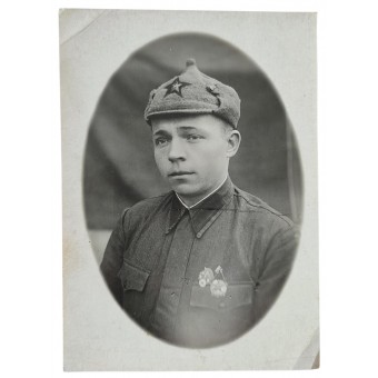 Red Army soldier with badges and Budyonovka hat. Espenlaub militaria