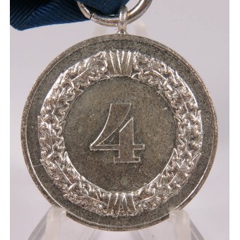 4 years service medal with ribbon. Espenlaub militaria