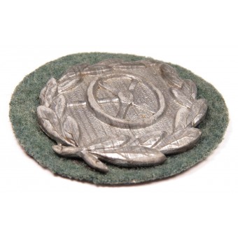 Silver grade driver badge in zinc. Espenlaub militaria