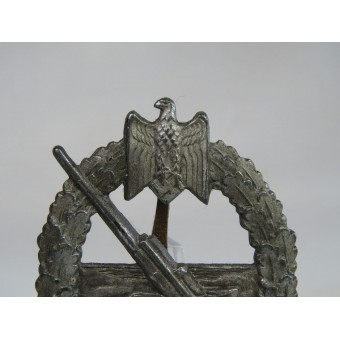 Costal Artillería insignia, marcado por C. E. Juncker Berlín.. Espenlaub militaria
