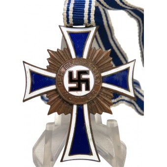 Ehrenkreuz der Deutschen Mutter en bronce. Con 30 cm de la cinta. Espenlaub militaria