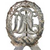 Omärkt DRL-emblem i silverklass av zink, ej märkt