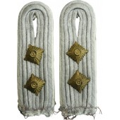Sew in shoulder boards of the Wehrmacht infantry Hauptmann
