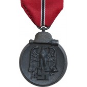 Medalla de la Winterschlacht de J.E. Hammer & Söhne con la inscripción 