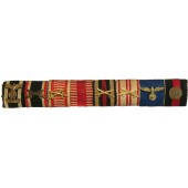Bandspange. Veteran des 1. Weltkriegs. 8 Auszeichnungen: 1. Weltkrieg, 2. Weltkrieg, Eisernes Kreuz mit Wiederholungsspange 1939