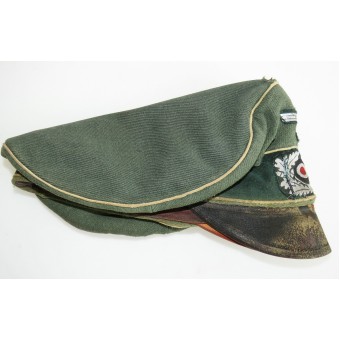 Salty Wehrmacht visor hat with traces of heavy frontline use. Espenlaub militaria