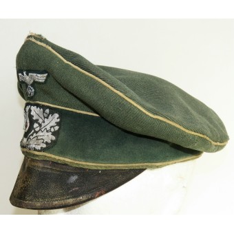 Cappello con visiera della Wehrmacht salata con tracce di un pesante utilizzo in prima linea. Espenlaub militaria