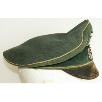 Salty Wehrmacht visor hat with traces of heavy frontline use. Espenlaub militaria