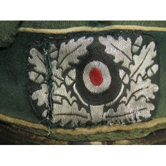 Cappello con visiera della Wehrmacht salata con tracce di un pesante utilizzo in prima linea. Espenlaub militaria