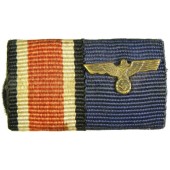 Cruz de hierro y medalla de servicio en barra de la Wehrmacht