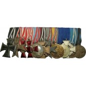 Barre de médailles avec 12 médailles pour la période de 1900 à 40's