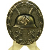 Distintivo di ferita tedesco della Seconda Guerra Mondiale, 3ª calss, in acciaio, marcato FK.