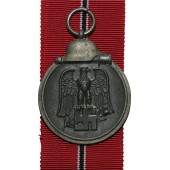 Omärkt medalj i zink från mitten av kriget 