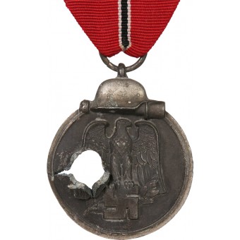 Medalla de la campaña 1941-42 en el frente oriental con daños de combate. Espenlaub militaria