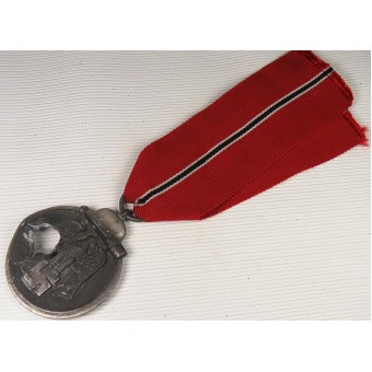 Medal for the 1941-42 campaign on the Eastern Front with battle damage. Espenlaub militaria