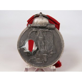 Medaille für den Feldzug 1941-42 an der Ostfront mit Kampfschaden. Espenlaub militaria