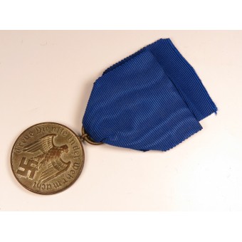 Médaille 4 Jahre treue Dienste in der Wehrmacht. Magnétique. Espenlaub militaria