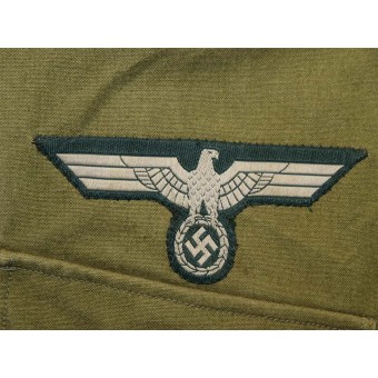 Wehrmacht Heer Unteroffizier vid 111:e bergsartilleriregementet Östfronten lätt Feldbluse. Espenlaub militaria