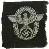Aquila a filo piatto della Polizei del Terzo Reich o della Polizei SS per il copricapo