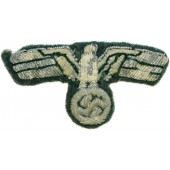 Wehrmacht Heer. Heavily worn condition visor or field hat bullion eagle.