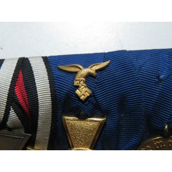 Medaljstång med fyra utmärkelser för lång tjänstgöring i Luftwaffe.. Espenlaub militaria