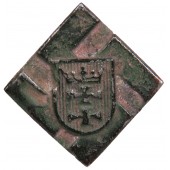 Första typen av Heimwehr Danzig-emblem. Reparerad