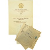 Verleihungsurkunde für das Deutsche Kreuz in Gold, ausgestellt für Feldwebel Hermann Harders und Papiere