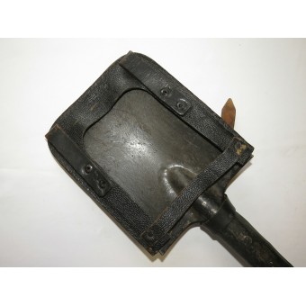 German entrenching tool with a leather cover marked: Lüttringhausen 1943. Espenlaub militaria