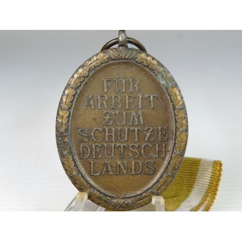 Medalla Westwal con 3 anillos marcado para Wilhelm Deumer, segundo tipo, después de 1944. Espenlaub militaria