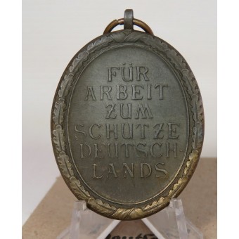 Deutsches Schutzwall Medaille. C. Poellath laukussa.. Espenlaub militaria