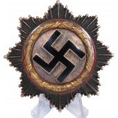 Cruz alemana en oro, marca del fabricante 