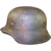 M 42 Camouflaged steel helmet. EF 64  