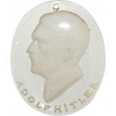 Glass pendant with a bas-relief of Hitler and the inscription on the bottom: Adolf Hitler