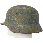 Casque en acier camo de la Luftwaffe trouvé sur le champ de bataille