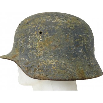 Стальной шлем люфтваффе.несколько слоев перекраса поверх зимнего камуфляжа. Espenlaub militaria