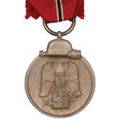 Ostmedaille. Interessante witte coating.