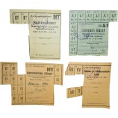 Toisen maailmansodan aika, elintarvike- ja tupakkakortit/-kupongit, jotka on myönnetty miehitetyssä Virossa.