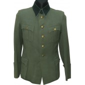 German Wehrmacht officer's tunic with a dark green collar and blue piping