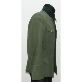 German Wehrmacht officers tunic with a dark green collar and blue piping. Espenlaub militaria