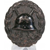 Een zwarte 1918 Wound badge. Gestanst ijzer in zwarte lak