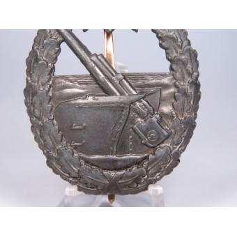The Kriegsmarine coastal artillery badge by Juncker. Espenlaub militaria