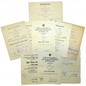 Conjunto de certificados de condecoración para un teniente de infantería de la Wehrmacht. Krim, Wolchow, Kurland. Raro