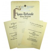 Un conjunto de documentos de adjudicación para un funcionario ferroviario del Tercer Reich