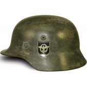 Двухдекальный стальной шлем образца 1935 го года для фронтовых подразделений полиции.