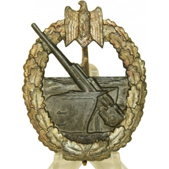 Kriegsmarine Kriegsabzeichen Bont Die MarineArtillerie / Coastal Artillery-badge in verguld zink, met Maker Ausf C.E. Juncker Berlin. Espenlaub militaria