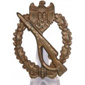 Insigne d'assaut de l'infanterie du FLL en bronze, creux. Voûté