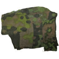 Frammento di uniforme mimetica delle Waffen-SS con riparazioni sul campo