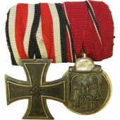 Verleihungsstange mit Eisernem Kreuz vom Typ Schinkel 1939, zweite Klasse, bezeichnet SW und Winterschlacht im Osten Medaille