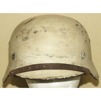 Tysk hjälm M35 ET 68/3251 i vintercamouflage. Espenlaub militaria